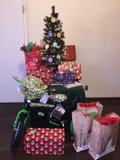 Families Helping Families tree with gifts