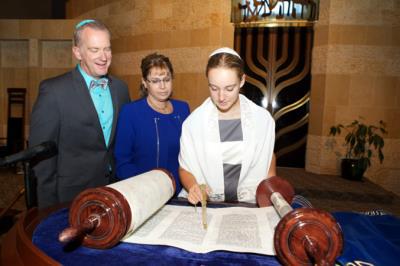 Girl reading the Torah