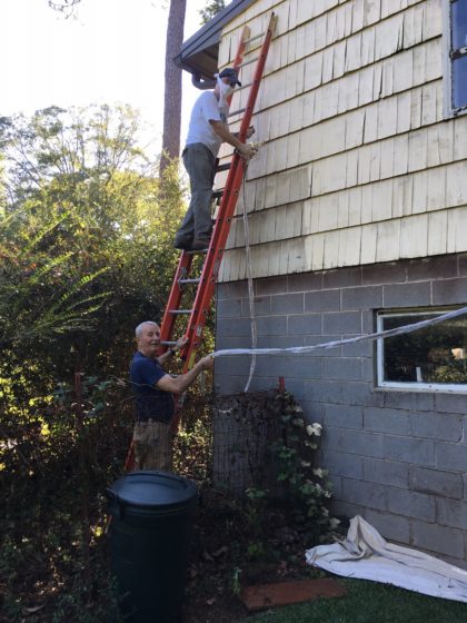 Members painting RE Wing